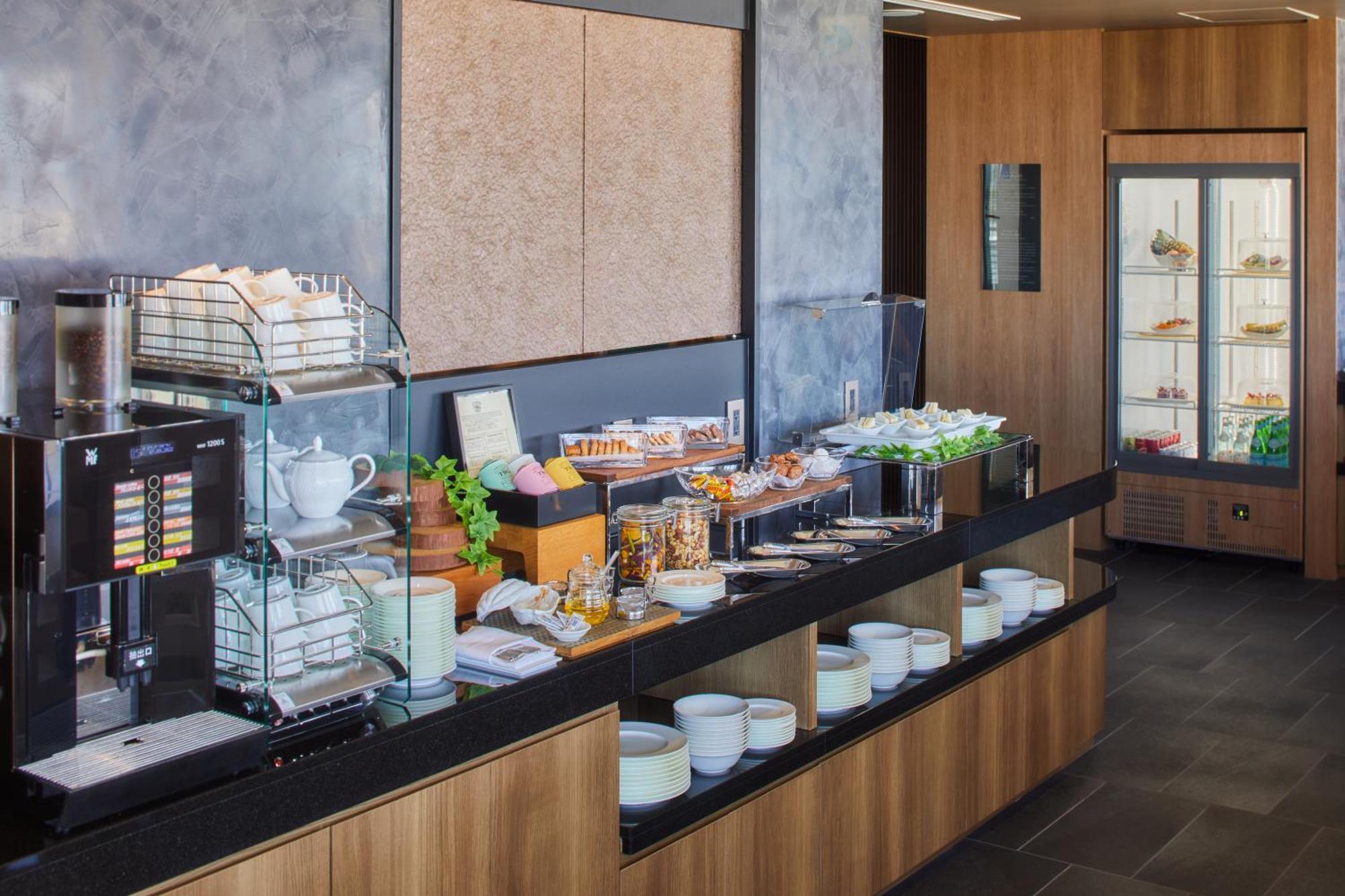נאהא Hotel Collective מראה חיצוני תמונה The buffet at the lounge